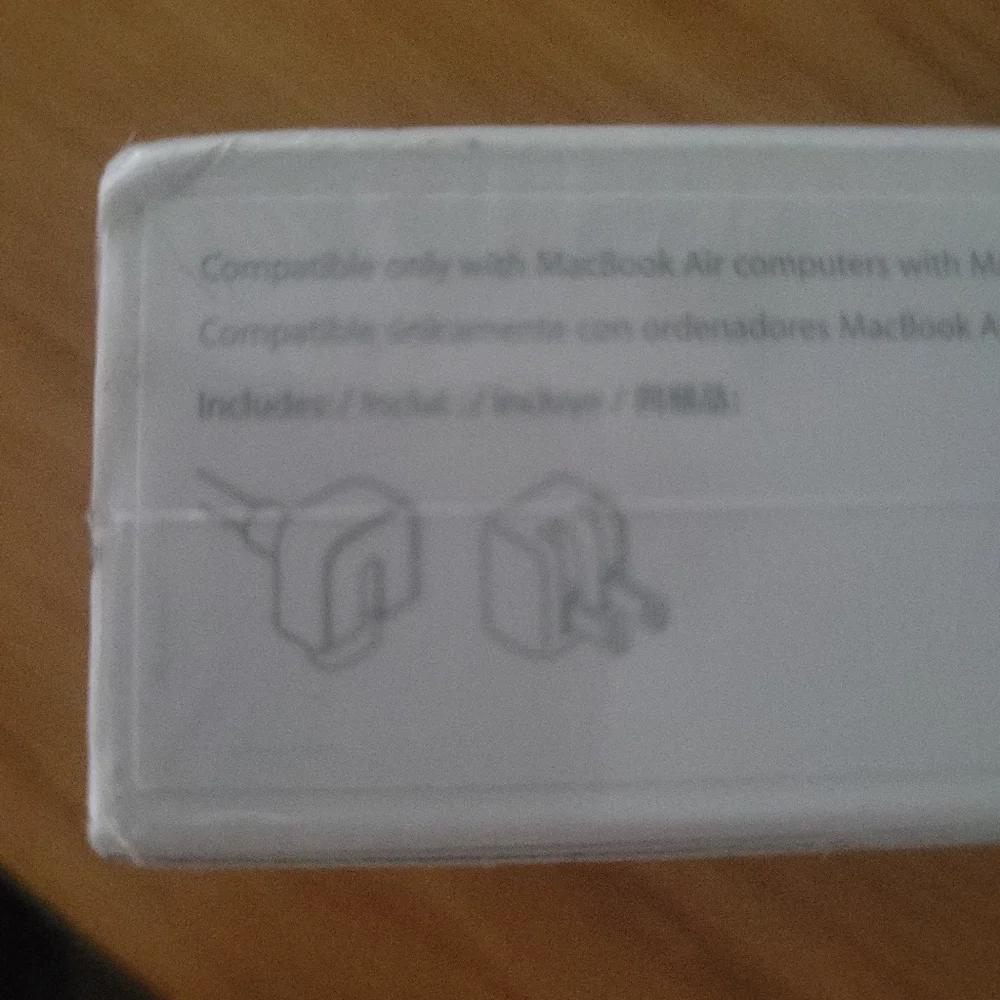 Apple 45W Magsafe 2 power adapter for MacBook Air.